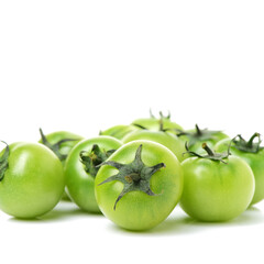 Green tomatoes on white background