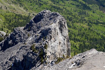 Hiking the Yamnuska Traverse view at the summit at the front range of the Canadian Rockies Alberta Canada