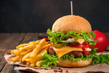 Delicious burger with vegetables and meat. Fast food.