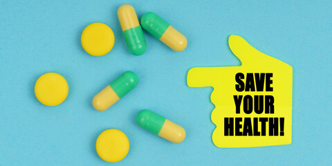 On a blue background, there are pills and a hand-sticker with the inscription - Save your health
