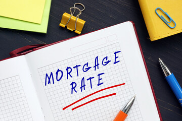 Business concept meaning MORTGAGE RATE with sign on the page. A mortgage rate is the rate of interest charged on a mortgage