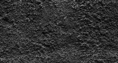 Dark wall surface with scratched paint