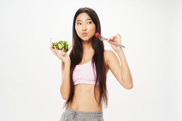 woman of asian appearance plate with salad healthy food snack