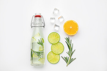Composition with bottle of healthy lemonade and citrus fruits on white background - obrazy, fototapety, plakaty
