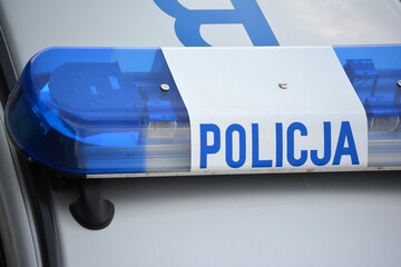Niebieskie światła błyskowe policji.  © FotoDax