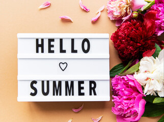 Light box with Hello Summer text and peonies