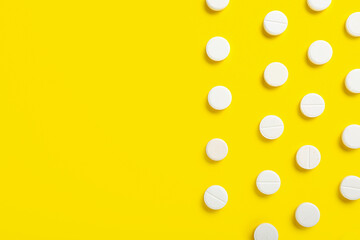 Many pills on color background