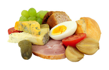 Ploughmans lunch with cheese, ham, boiled egg and pickles isolated on a white background
