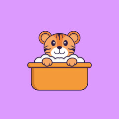 Cute tiger taking a bath in the bathtub. Animal cartoon concept isolated. Can used for t-shirt, greeting card, invitation card or mascot. Flat Cartoon Style