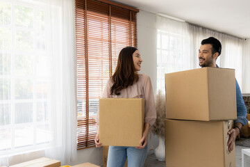 The family just bought new furniture and helped organize the house. Husband and wife just moving...