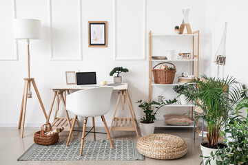 Interior of stylish room with modern workplace