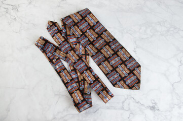 Blue tie with geometric pattern