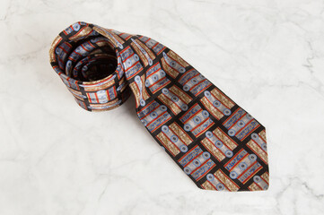Blue tie with geometric pattern