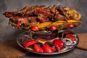 BBQ meat and vegetables. Meat still life. Grilled meat and vegetables. Beef with vegetables.