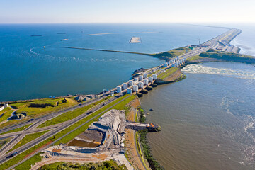 Aerial from sluices at Kronwerderzand at the Afsluitdijk in the Netherland - obrazy, fototapety, plakaty
