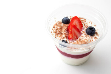 Dessert cottage cheese mousse with strawberries, granola, blueberries.