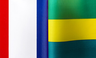 fragments of the national flags of France and the Gabonese Republic close-up