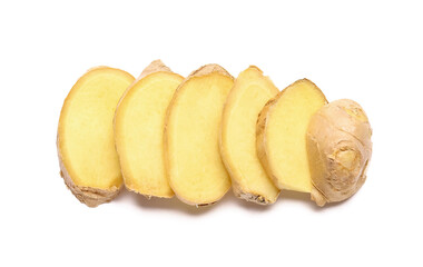 Slices of fresh ginger on white background