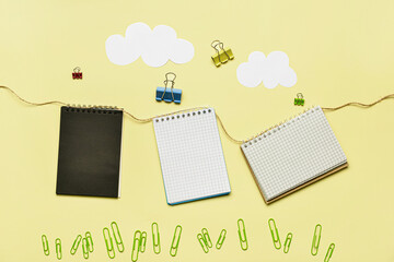 Creative composition with school supplies on color background