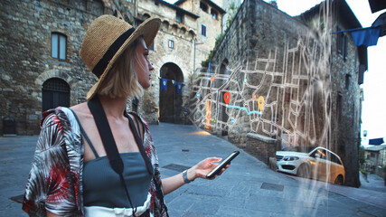 Obraz na płótnie Canvas Young attractive beautiful woman using smartphone traveling across old city with map app online. Internet communication, shopping worldwide. Successful businesswoman lifestyle.