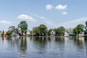 Dutch houses in the typical Dutch town Broek in Waterland, the Netherlands