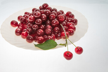 fresh cherries on wooden table