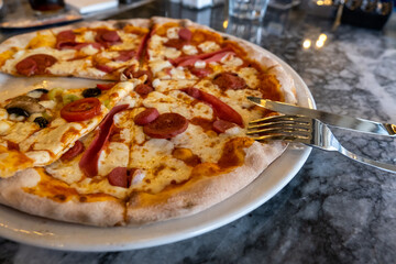 pizza on marble floor, top view