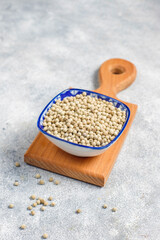 White peppercones in a small bowl and jar.