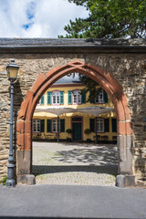 Round arch in a wall to a mansion in the Taunus / Germany 