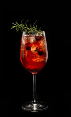 Forest aperol spiritz cocktail on black background.