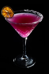 Margarita Cocktail Drink in Glass, Frozen Alcohol with Lime, Salt on black background.