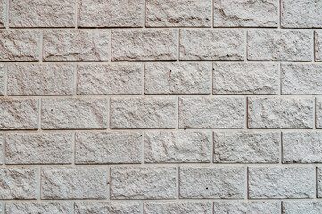 Obraz premium The wall of the house is made of tiles