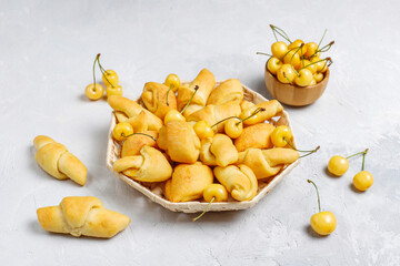Homemade cookies with sweet yellow cherries.