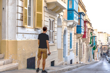 young tourist exploring the streets of Sliema, Malta