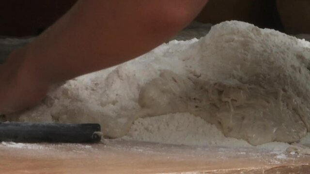 Baking bread old style on the event medieval week in the city of visby on the island Gotland in Sweden