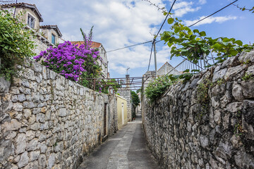 Picturesque old stone narrow street in Cavtat. Cavtat - coastal town in the southern Konavle region of Croatia, just 20 kilometers away from Dubrovnik.
