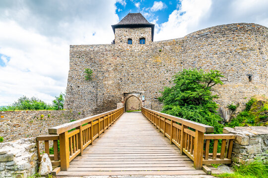 Medieval castle Helfstyn, Czech Republic. Ancient castle in gothic style. Castle walls and interiors, beautiful old tower. Summer weather, blue sky with clouds. Famous trip destination.