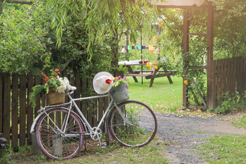 Vintage bike with basket and flowers. Picnic.
