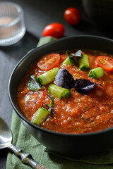 gazpacho on a black background