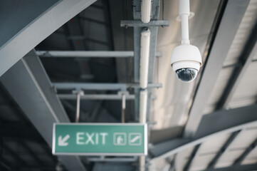 Modern CCTV security system on sky background Smart camera theft protection.