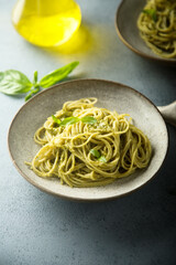 Traditional homemade pasta with pesto sauce	