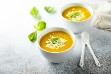 Healthy homemade pumpkin soup with cheese