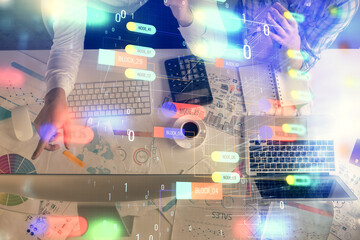 Double exposure of man and woman working together and data theme hologram drawing. Computer background. Top View.