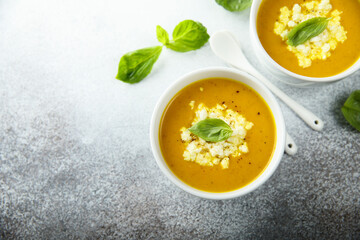 Healthy homemade pumpkin soup with cheese