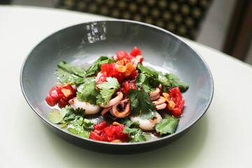 Healthy seafood salad with tomatoes