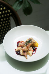 Roasted quail with berry sauce