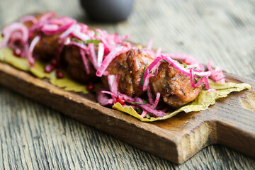 Traditional homemade kebab with pikled onion