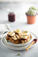 Grilled cheese with beetroot paste on toast