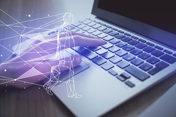 Double exposure of woman hands typing on computer and creative drawing. Start up concept.