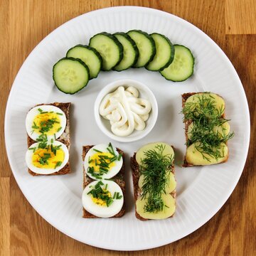 traditional danish open sandwich with egg, chives and popato, dill ( sm&oslash;rrebr&oslash;d )